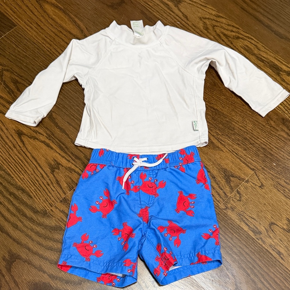 Green Sprouts White Rashguard and Little Me Blue Crab Swim Shorts